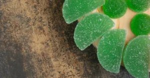 Lime green candy first gained traction in the mid-20th century, a time when mass production of sweets reached new heights and food dye technology allowed for more vivid, consistent coloring.